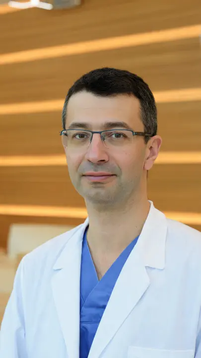 Professional female doctor or health specialist portrait in white coat, holding tablet